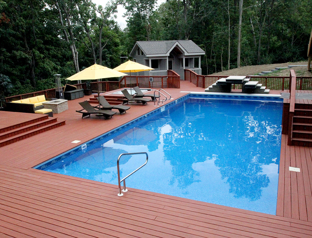 In-ground pool with deck