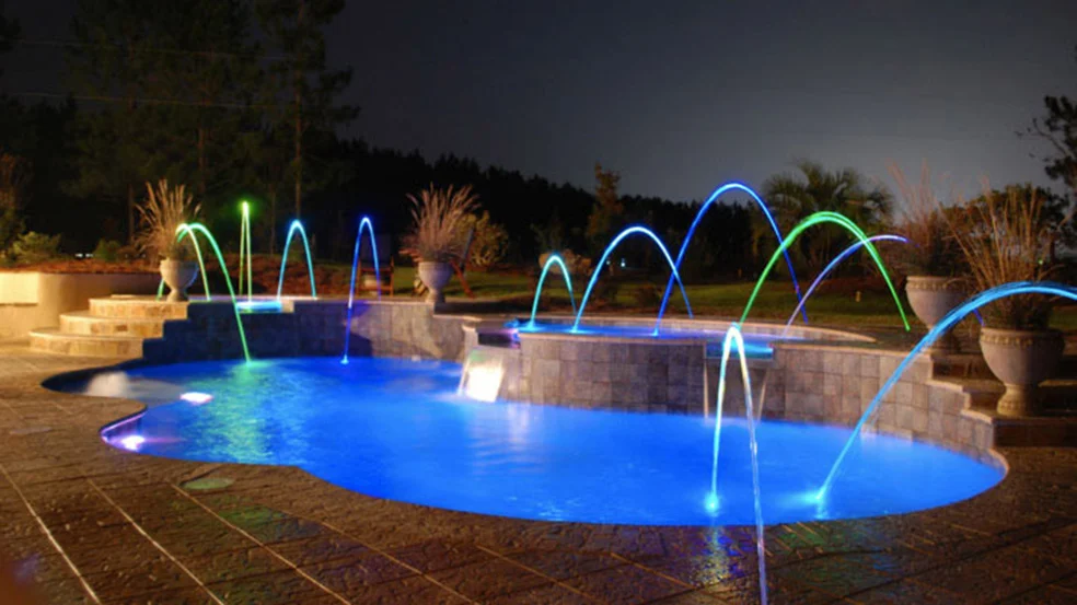Enjoy life with your Trilogy Pool from Knickerbocker Pools and Spas — with fun lighting.